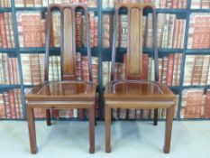 A pair of Chinese rosewood chairs.