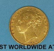 An 1864 young head gold full sovereign, shield back,