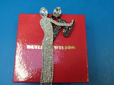 A Butler and Wilson paste brooch in the form of a dancing couple in the Art Deco style