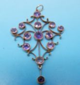 A large Edwardian pendant set with amethysts