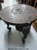 A dark wood Indian-elephant legged table ornately carved (H62cm,