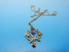 A 9ct gold Edwardian pendant set with amethyst and seed pearls