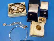 A 9ct gold ring set with blue and clear stones, silver ring, 9ct gold ring set with white sapphire,