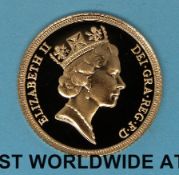 A cased proof gold full sovereign for 1987 with certificate no 02587