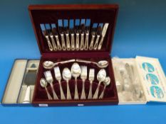 A six place canteen of cutlery together with a cased Royal Worcester cake slice and a fish set