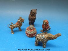 Four Northern Indian turquoise and coral decorated animals and a bronze owl