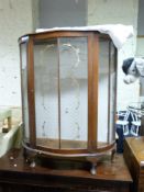 A retro glazed walnut cabinet