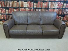 A leather suite comprising three seat sofa,