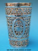 A pierced white metal beaker holder, possibly Indian (height 12cm,