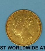 An 1854 young head gold full sovereign shield reverse VF