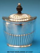 A Victorian hallmarked silver tea caddy with fluted lid and lower half, Sheffield 1896,