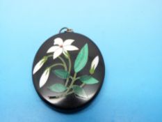 A pietra dura pendant depicting flowers