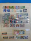 A large stockbook of Commonwealth and foreign stamps including many early issues, Iraq overprints,