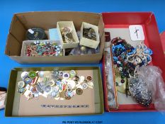 A large collection of costume jewellery include 9ct gold earrings, 9ct gold chain, badges,