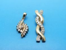 Two 9ct gold pendants set with diamonds