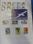 An extensive collection of Norfolk Island stamps in four stockbooks,