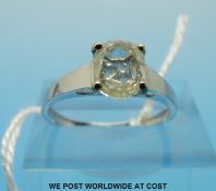 An 18ct white gold ring set with an oval cut diamond of approximately 0.