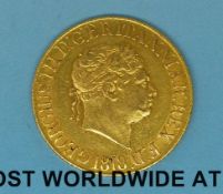 An 1818 George III gold full sovereign,