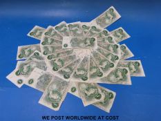 Thirty two circulated pre-decimal Bank of England one pound notes L K O'Brien
