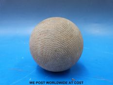 A vintage wooden possible polo ball stamped 