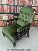 A 19thC mahogany upholstered armchair with bobbin turned supports under arms