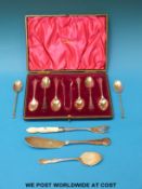 A cased set of Walker and Hall hallmarked silver teaspoons and sugar tongs together with four other