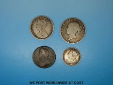 A trio of Victorian silver coins including a young head halfcrown and a Gothic florin,