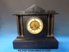 A black slate mantel clock with two train movement,