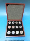 A deluxe cased commemorative RMS Titanic coin collection with applied colour,