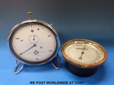 A Pye timer together with a brass-cased aneroid barometer