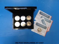 A 'Kitchener poster' first world war cased centenary crown collection comprising six gold plated 38.