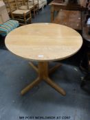 A modern beech extending dining or kitchen table-