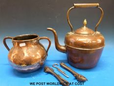 An Arts & Crafts copper two handled vase with riveted handles,