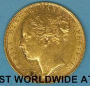 An 1875 young head gold full sovereign, type 2 reverse,