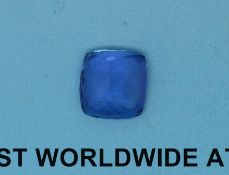 A tanzanite in a cushion cut measuring 3.