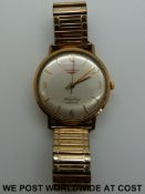 Longines Flagship automatic 9ct gold gentleman's wristwatch with Arabic and baton numerals and