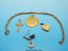A 9ct gold St Christopher pendant, 9ct gold heart locket,  9ct gold pendant,
