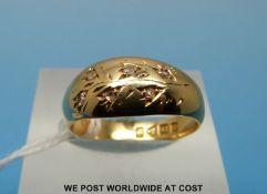 An 18ct gold ring set with six diamonds in a foliate design (size N, 5.