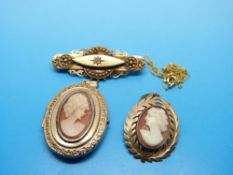 A 15ct gold brooch set with a diamond, 9ct gold locket set with a cameo,