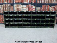 A vintage set of shopfitting / haberdashery / engineer's metal cubby holes with brass ticket