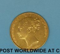 An 1864 young head gold full sovereign shield reverse,