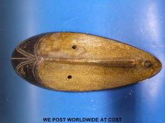 A 19th/20thC carved and painted African mask