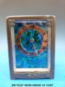 An Archibald Knox for Liberty and Co carriage clock with Arts and Crafts pewter case and copper and