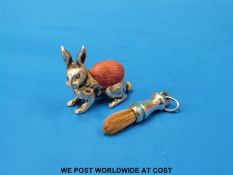 A hallmarked silver hare pin cushion,