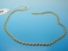 A 9ct gold necklace of wave shaped links (7.