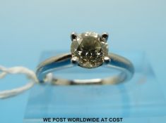 A 18ct white gold ring set with a round brilliant cut solitaire diamond of approximately 0.