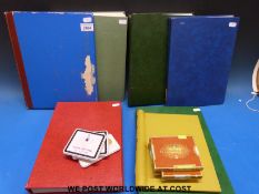 A large quantity of mainly QEII GB stamps in seven stockbooks together with sundry tins of stamps