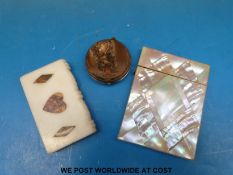 A mother of pearl card case,