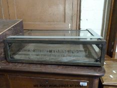 A Superdry glass and metal counter top shopfitting display cabinet (H15 x W60 x D46cm)
