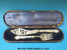 A cased set of hallmarked silver Victorian fish servers, Sheffield 1858,
